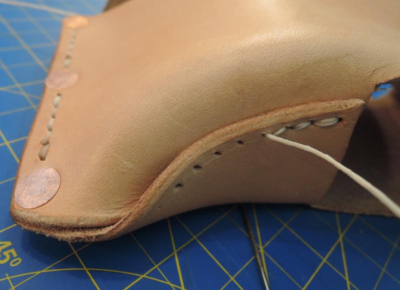 Sewing the bottom flap. This would later be reinforced by a rivet